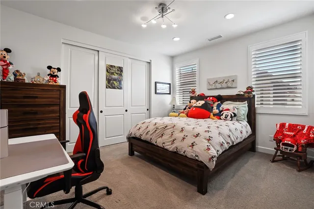 a outdoor living space with furniture and a fireplace