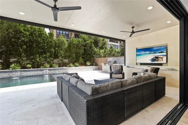 a view of a swimming pool with a patio