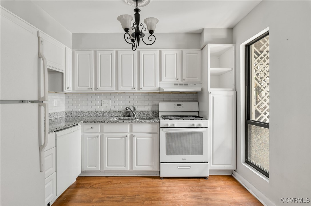 10174 Iron Mill Road North Chesterfield, VA 23235 - Photo 3 of 19 a kitchen with stainless steel appliances granite countertop a stove and a refrigerator