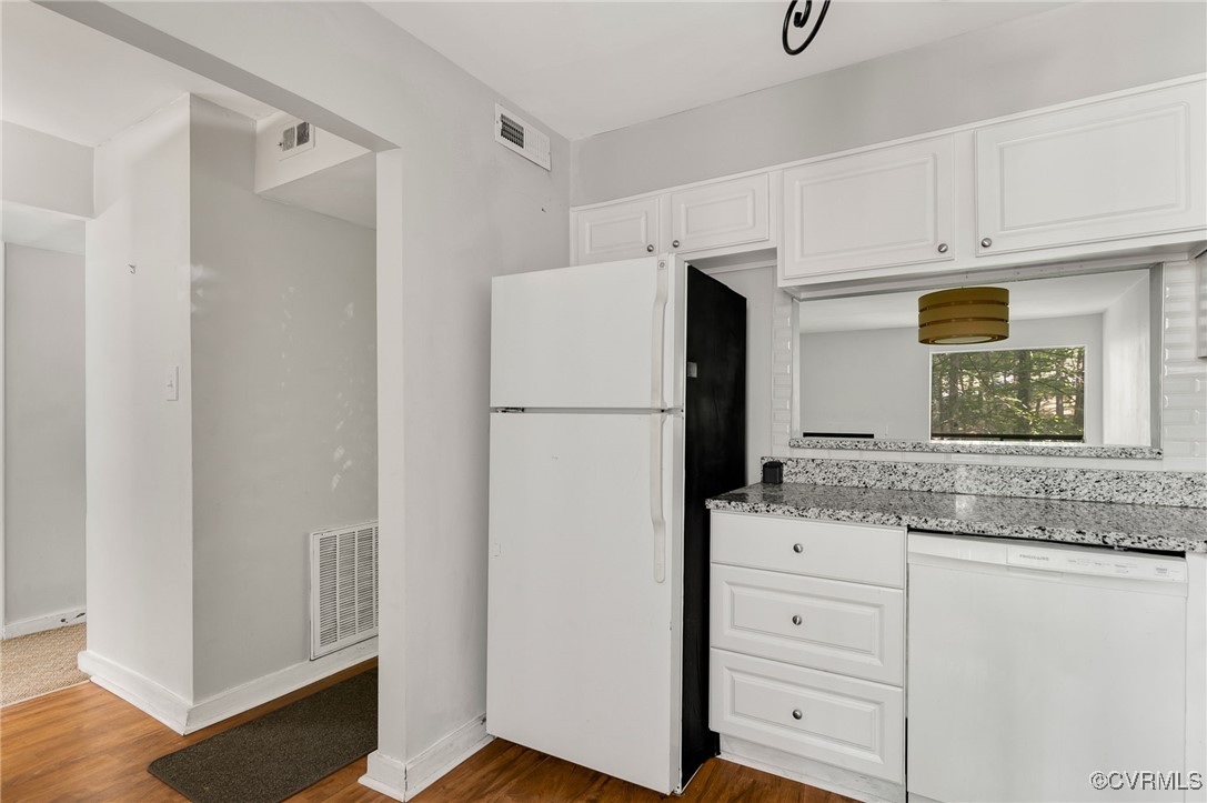 10174 Iron Mill Road North Chesterfield, VA 23235 - Photo 5 of 19 a kitchen with appliances cabinets and a counter top space