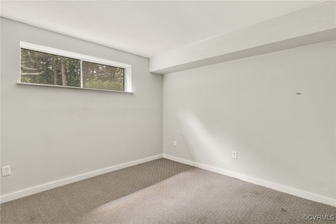 10174 Iron Mill Road North Chesterfield, VA 23235 - Photo 10 of 19 an empty room with windows