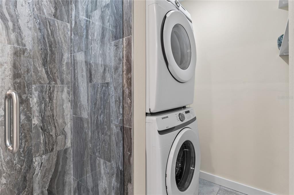 3405 Clark Road, Unit 205 Sarasota, FL 34231 - Photo 18 of 28 a utility room with dryer and washer