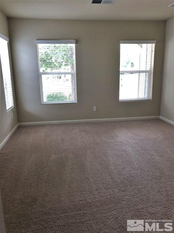 230 Gramercy Lane Reno, NV 89509 - Photo 16 of 20 an empty room with a window
