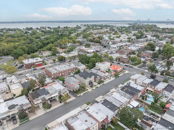 an aerial view of a city with lots of residential buildings