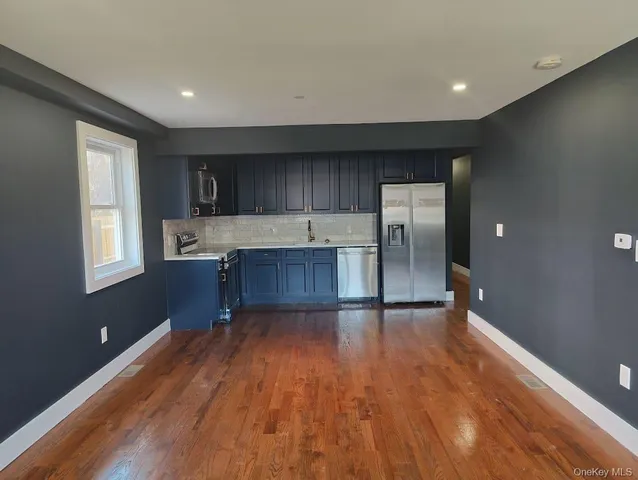 a bathroom with a sink and a shower