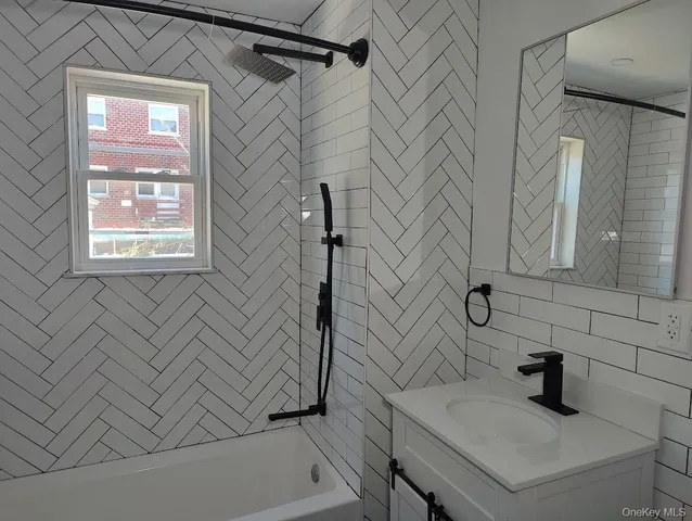 a view of a room with wooden floor and windows