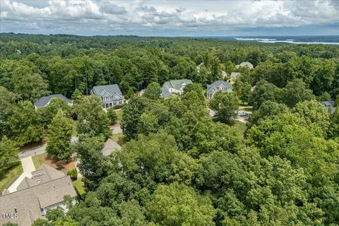 an aerial view of residential house with outdoor space