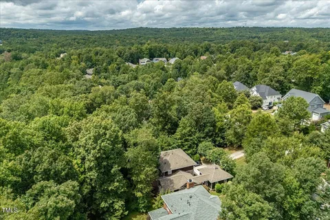 a view of a yard with an outdoor seating
