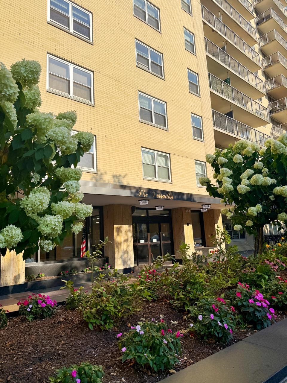 6600 Boulevard East, Unit 22B West New York, NJ 07093 - Photo 18 of 20 a front view of a building with garden