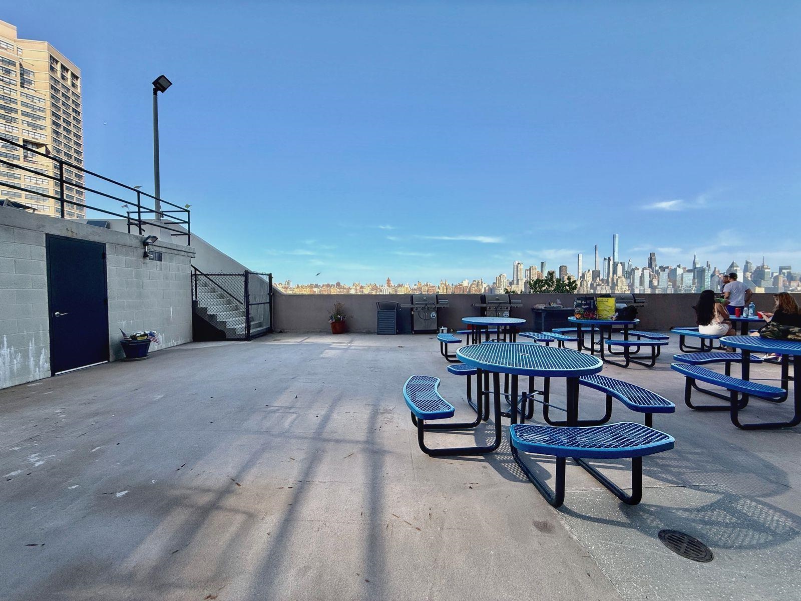 6600 Boulevard East, Unit 22B West New York, NJ 07093 - Photo 20 of 20 a view of a terrace with furniture