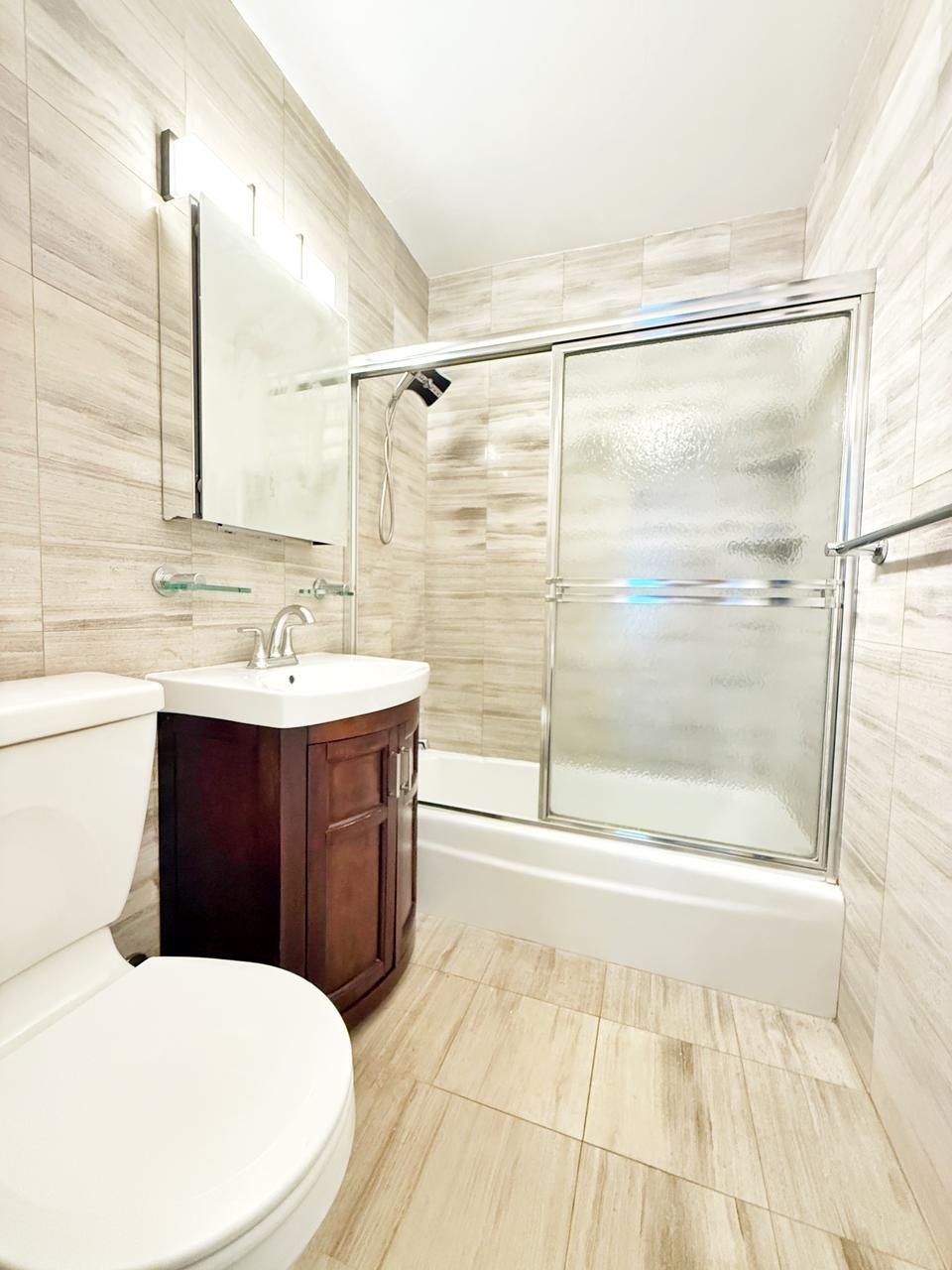 6600 Boulevard East, Unit 22B West New York, NJ 07093 - Photo 7 of 20 a bathroom with a sink toilet and shower