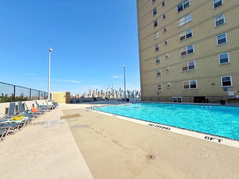 6600 Boulevard East, Unit 22B West New York, NJ 07093 - Photo 10 of 20 a view of a terrace with yard