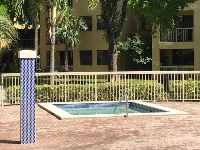 a view of a house with a fence