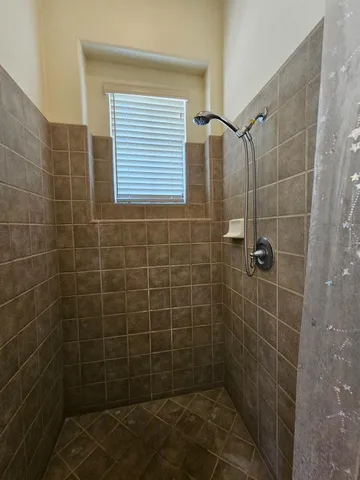 a view of a large building with a yard