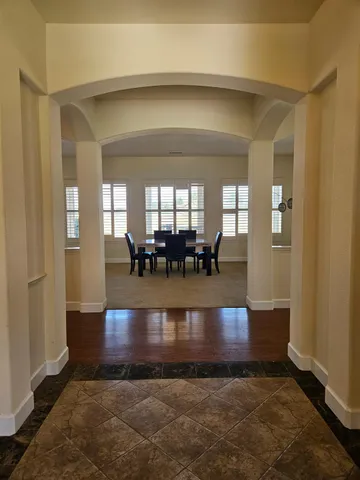 a view of a livingroom with furniture and a fireplace