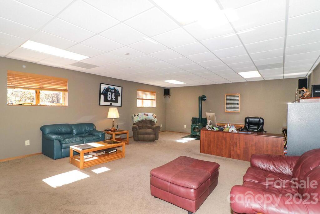 3449 Lee Moore Road Maiden, NC 28650 - Photo 36 of 48 a living room with furniture ceiling fan and a window
