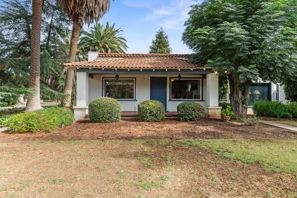 a view of swimming pool with a patio