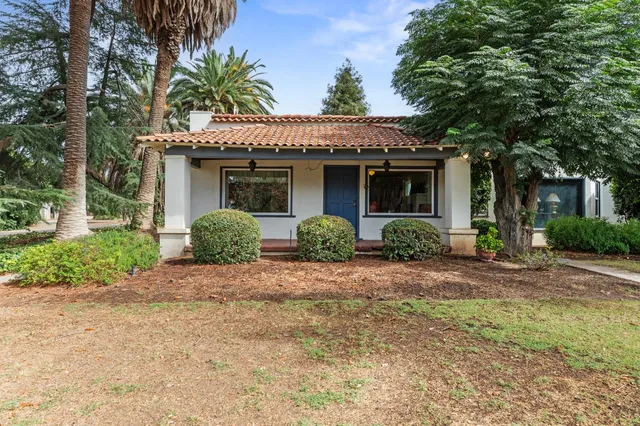a view of swimming pool with a patio
