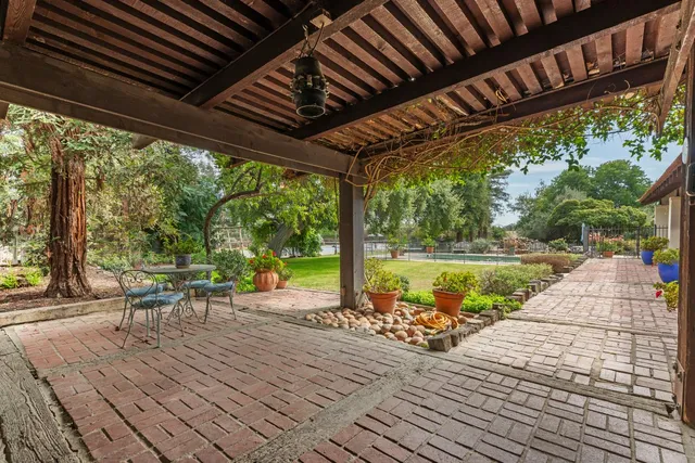 a outdoor living space with furniture and garden view