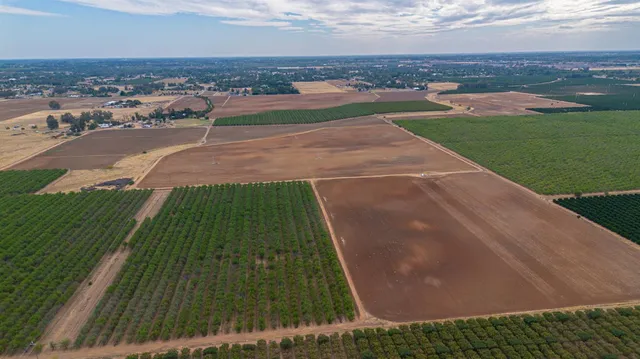 an aerial view of beach and ocean