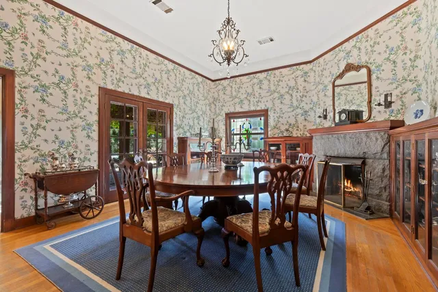 a view of living room and wooden floor