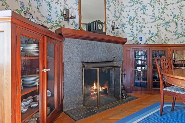 a kitchen with stainless steel appliances kitchen island granite countertop a sink and cabinets