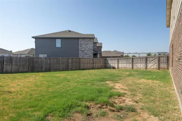 a view of a backyard with a garden