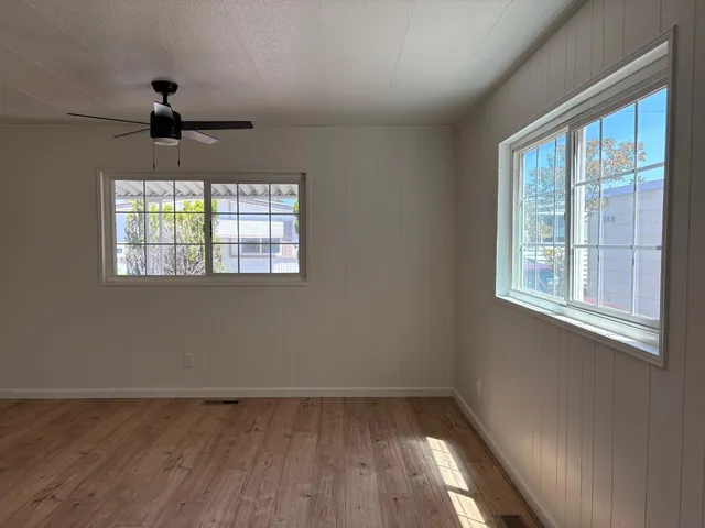 an empty room that has a window