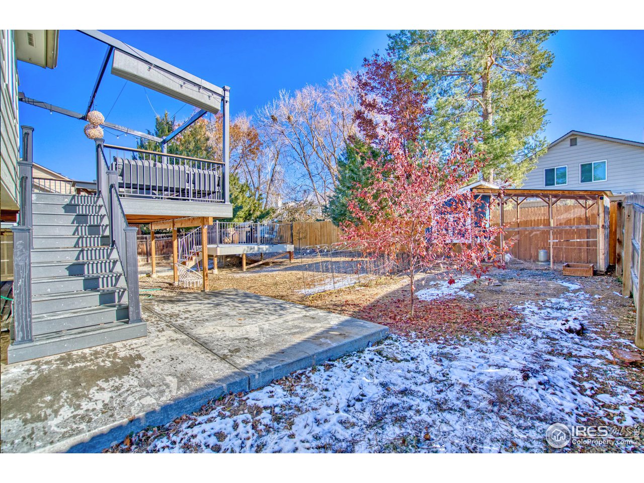 2154 Stuart Street Longmont, CO 80501 - Photo 16 of 27 a view of a house with a backyard