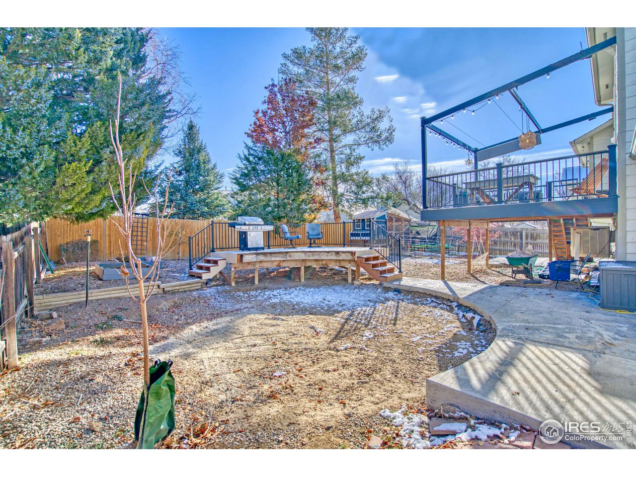 2154 Stuart Street Longmont, CO 80501 - Photo 19 of 27 a view of a swimming pool with a patio