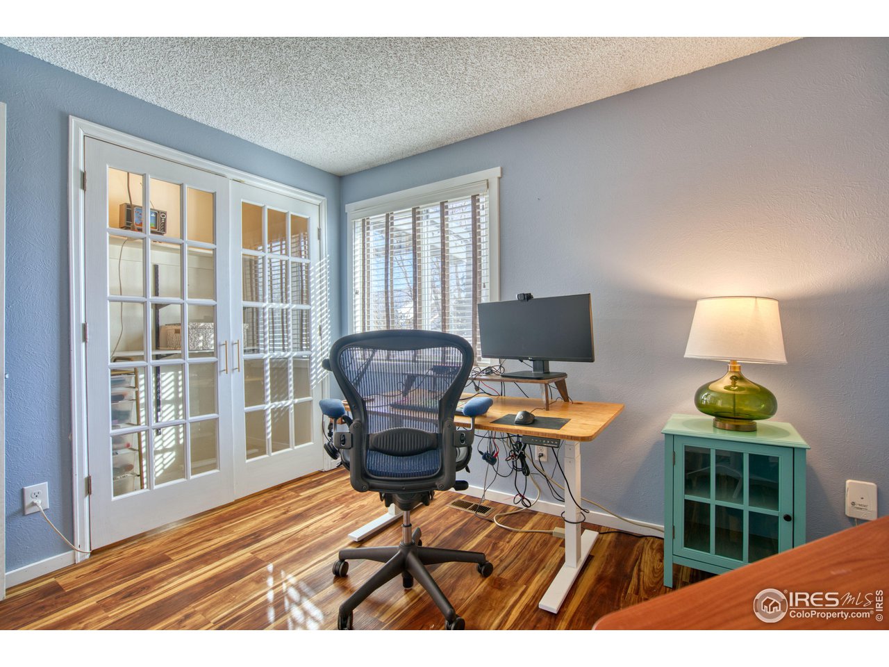 2154 Stuart Street Longmont, CO 80501 - Photo 20 of 27 a workspace with furniture and a window