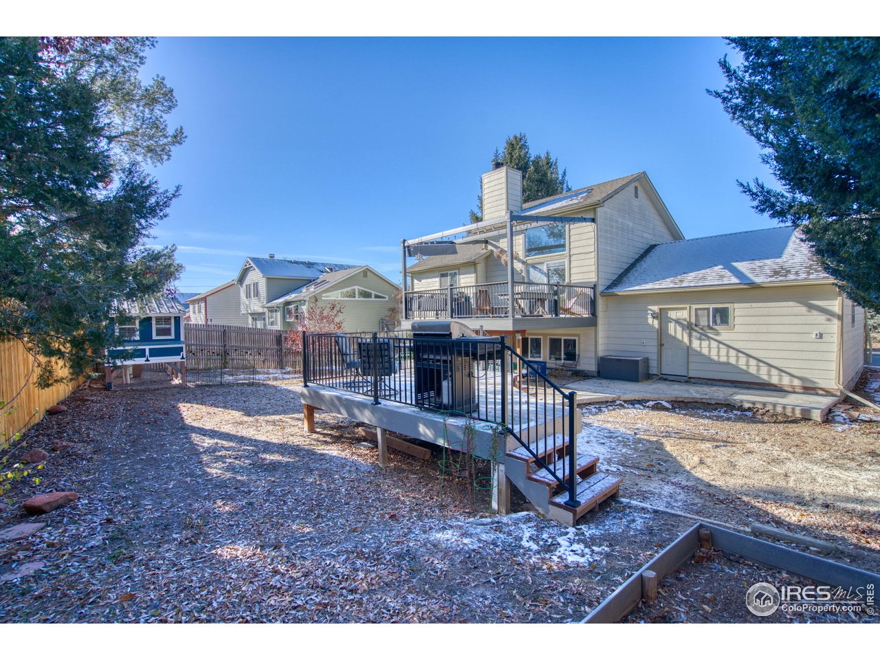 2154 Stuart Street Longmont, CO 80501 - Photo 23 of 27 a view of a house with backyard and sitting area