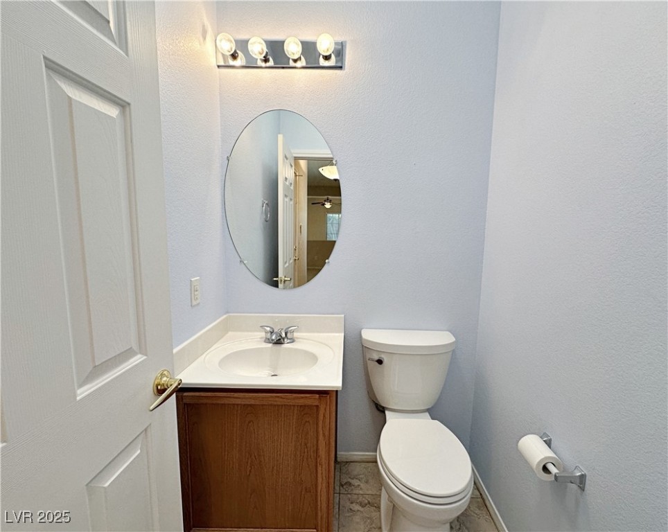 9620 Sharp Horn Court Las Vegas, NV 89149 - Photo 19 of 40 Bathroom featuring vanity and a textured wall