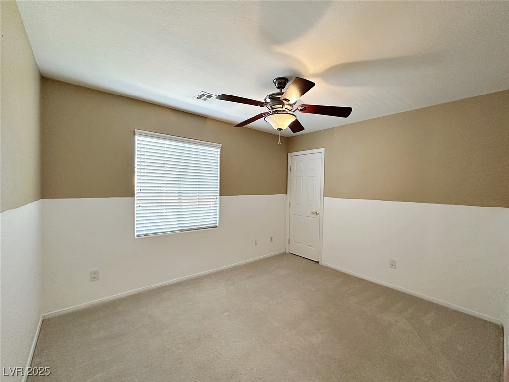 9620 Sharp Horn Court Las Vegas, NV 89149 - Photo 22 of 40 Unfurnished room featuring carpet and ceiling fan