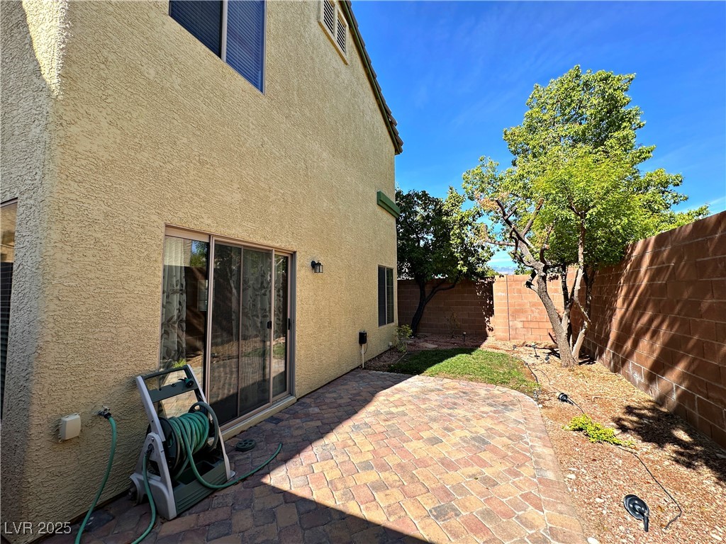 9620 Sharp Horn Court Las Vegas, NV 89149 - Photo 36 of 40 Fenced backyard with a patio area