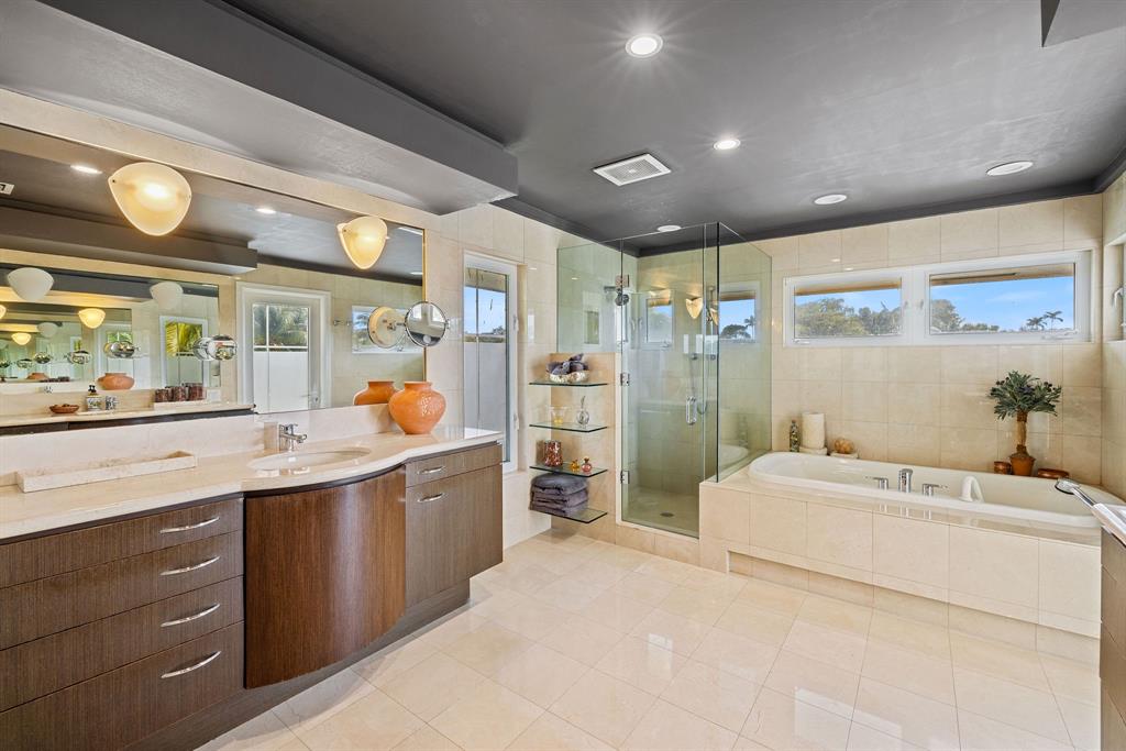 3150 North 35th Street Hollywood, FL 33021 - Photo 36 of 48 a large white room with a sink and large mirror