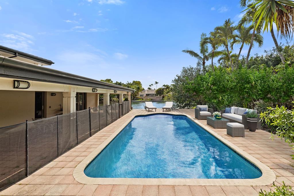 3150 North 35th Street Hollywood, FL 33021 - Photo 45 of 48 a view of a swimming pool with a lounge chair