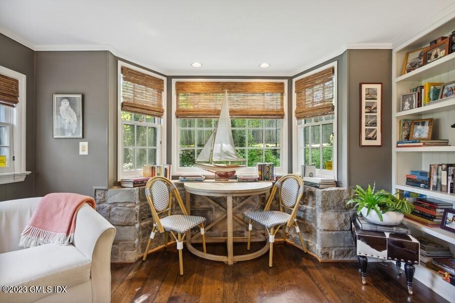 21 Stanwich Lane Greenwich, CT 06830 - Photo 16 of 45 a dining room with furniture window and wooden floor