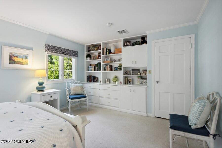 21 Stanwich Lane Greenwich, CT 06830 - Photo 27 of 45 a room with a bed and furniture