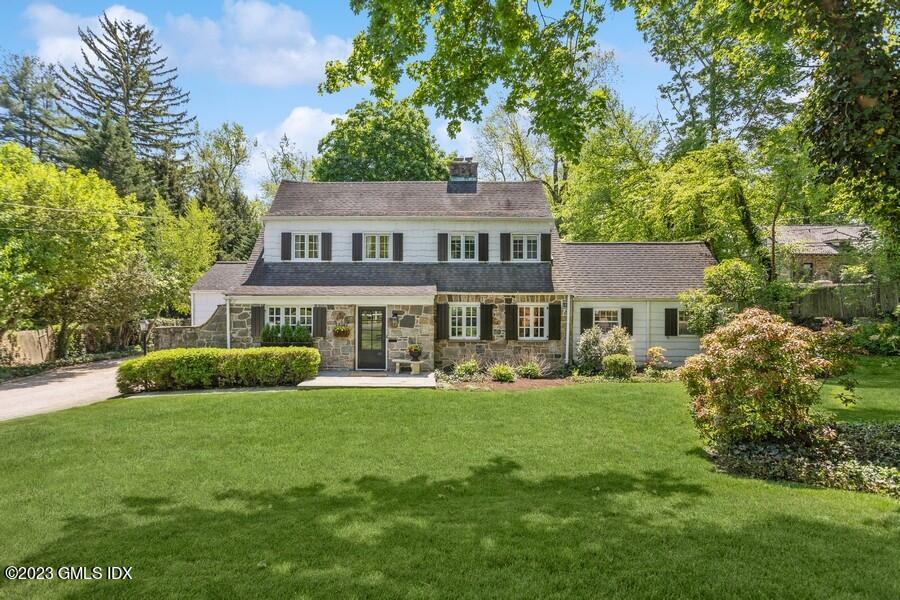 21 Stanwich Lane Greenwich, CT 06830 - Photo 3 of 45 a view of a house with a yard and sitting area