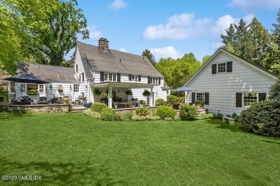 21 Stanwich Lane Greenwich, CT 06830 - Photo 36 of 45 a front view of house with yard and green space