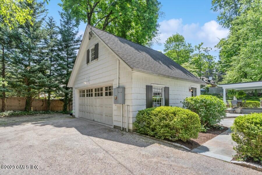 21 Stanwich Lane Greenwich, CT 06830 - Photo 39 of 45 a house with a tree in front of it