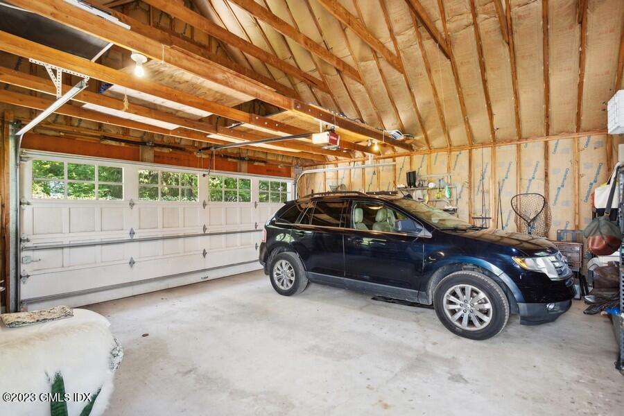 21 Stanwich Lane Greenwich, CT 06830 - Photo 40 of 45 a view of a car in a garage