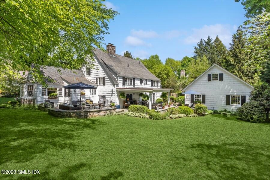21 Stanwich Lane Greenwich, CT 06830 - Photo 4 of 45 a front view of house with yard and green space