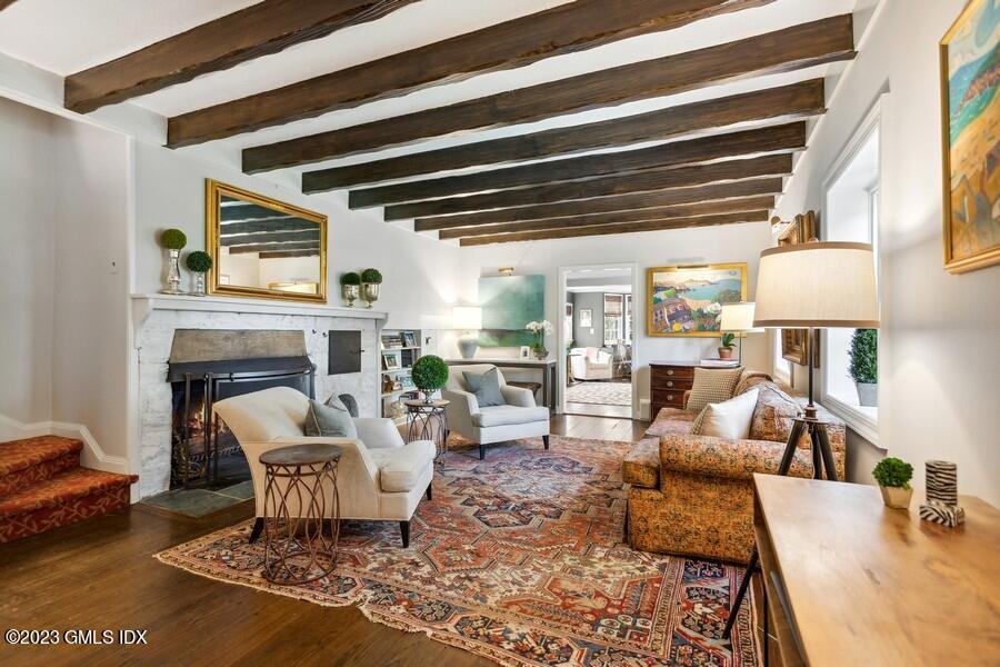 21 Stanwich Lane Greenwich, CT 06830 - Photo 5 of 45 a living room with furniture and a fireplace