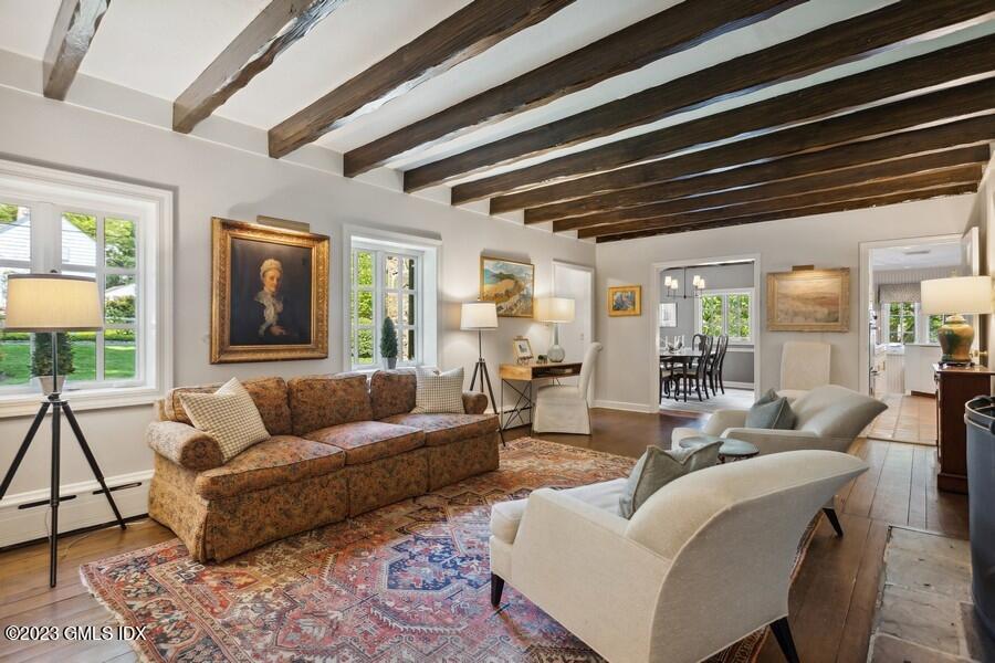 21 Stanwich Lane Greenwich, CT 06830 - Photo 6 of 45 a living room with furniture and a large window