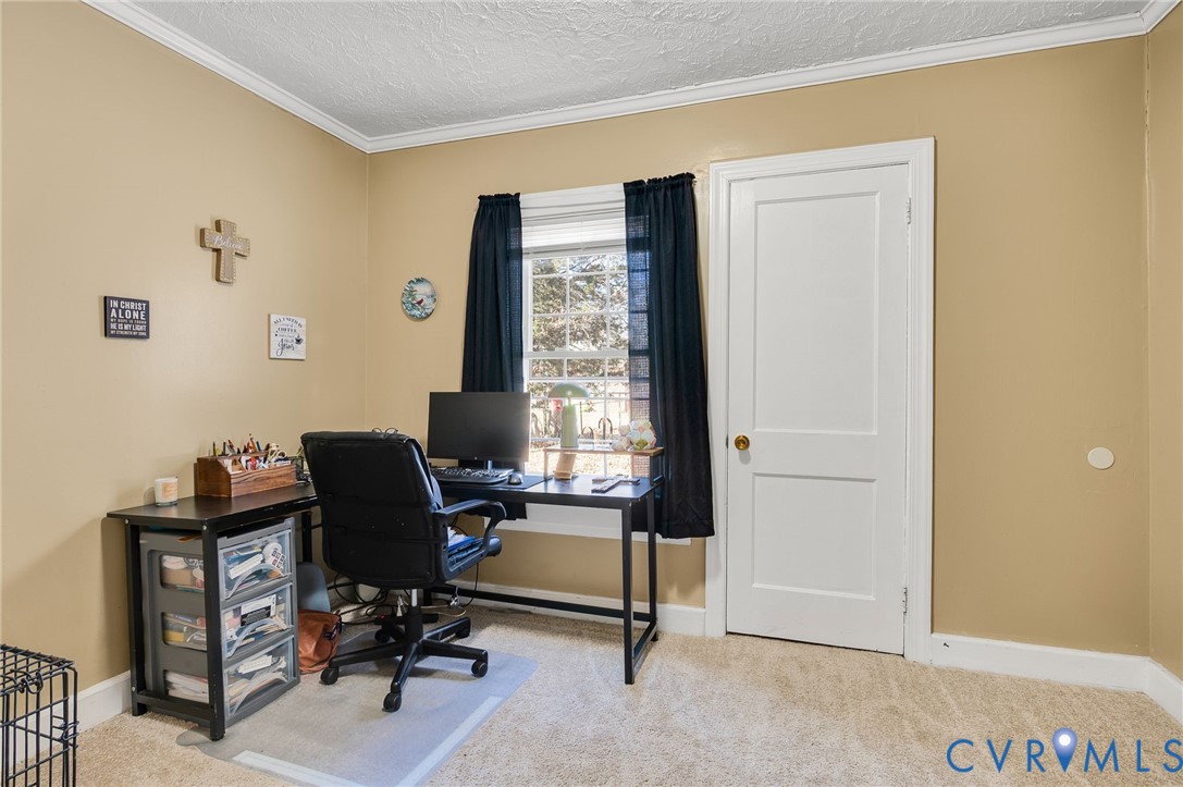 3203 Courthouse Road Hopewell, VA 23860 - Photo 11 of 23 a view of a workspace with furniture and a window