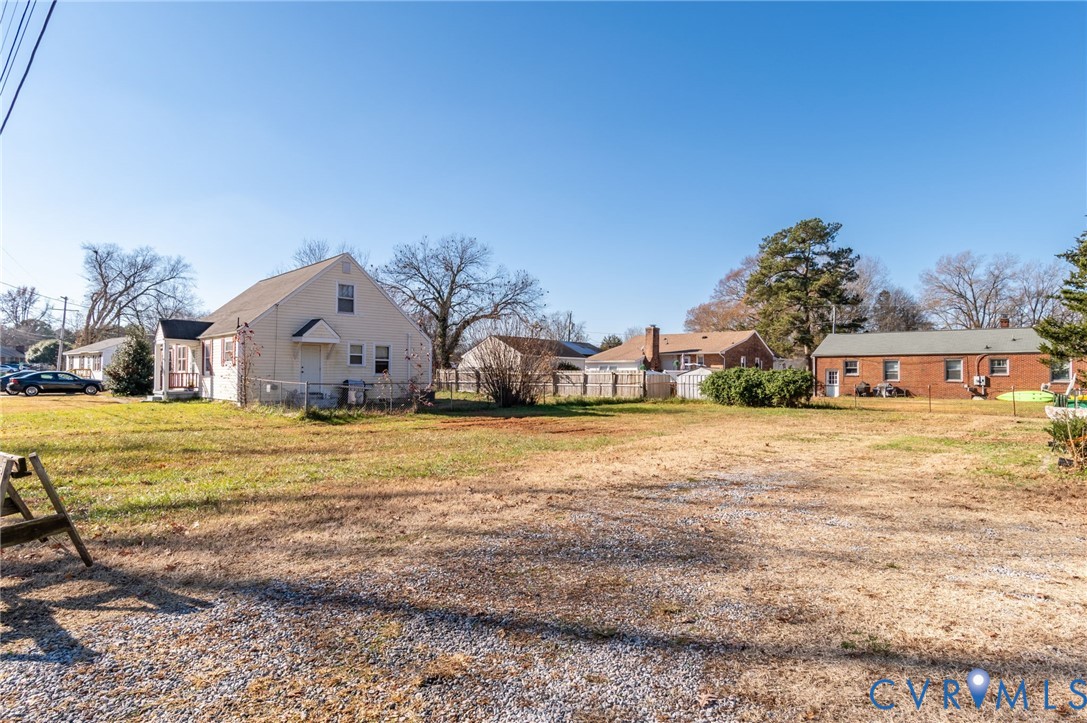 3203 Courthouse Road Hopewell, VA 23860 - Photo 20 of 23 a view of a white house with a yard