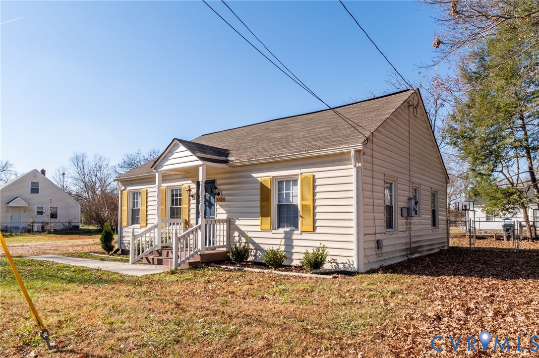 3203 Courthouse Road Hopewell, VA 23860 - Photo 2 of 23 a front view of a house with a yard