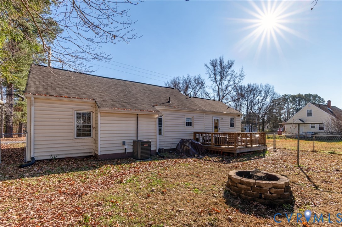 3203 Courthouse Road Hopewell, VA 23860 - Photo 21 of 23 a backyard of a house with barbeque oven and outdoor seating